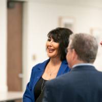 President Mantella talks with Thompson Foundation staff and trustees